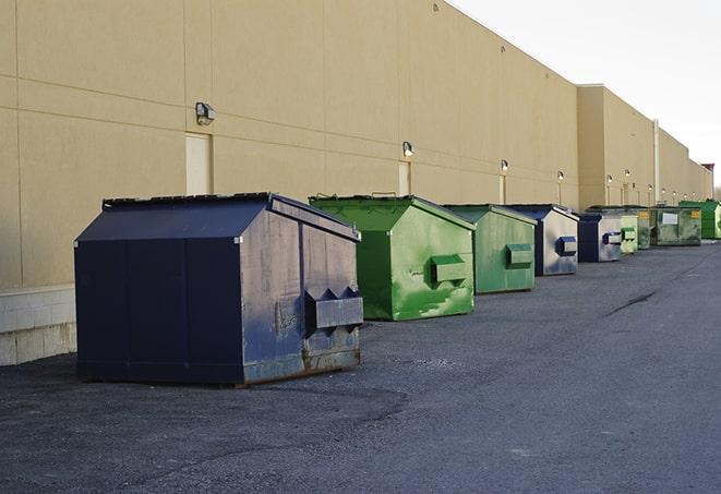 an empty dumpster ready for use at a construction site in Enoree